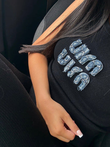 TOP NOIR COTELÉ AVEC LOGO BLEU